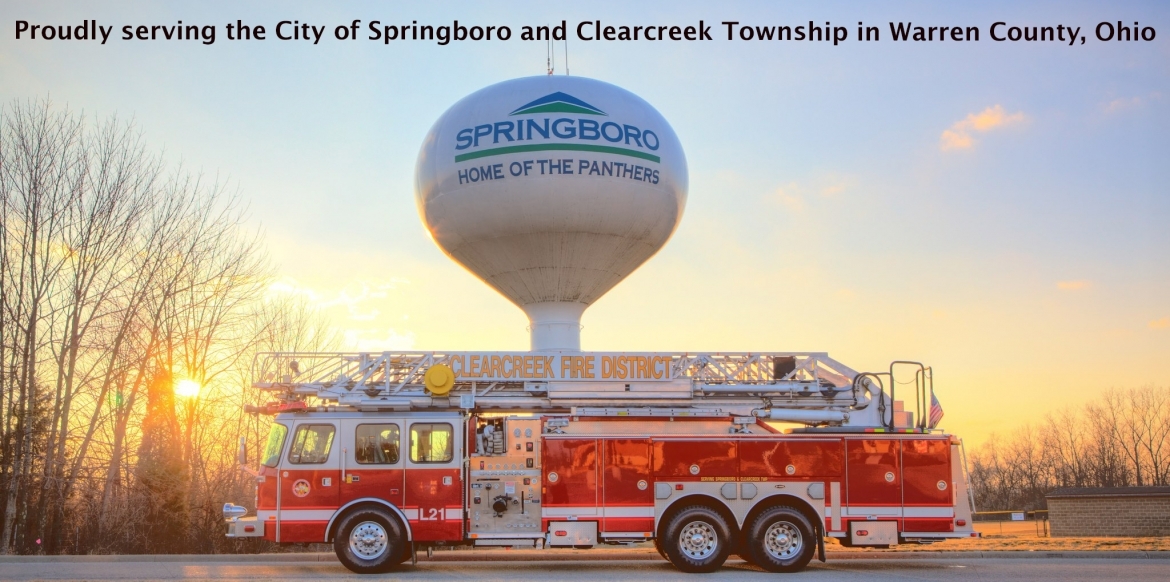 Firetruck in front of Springboro water tower with "Proudly serving the City of Springboro and Clearcreek Township in Warren County, Ohio" text